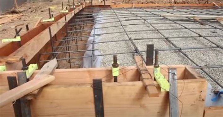 Where should reinforcement be placed in the slab?